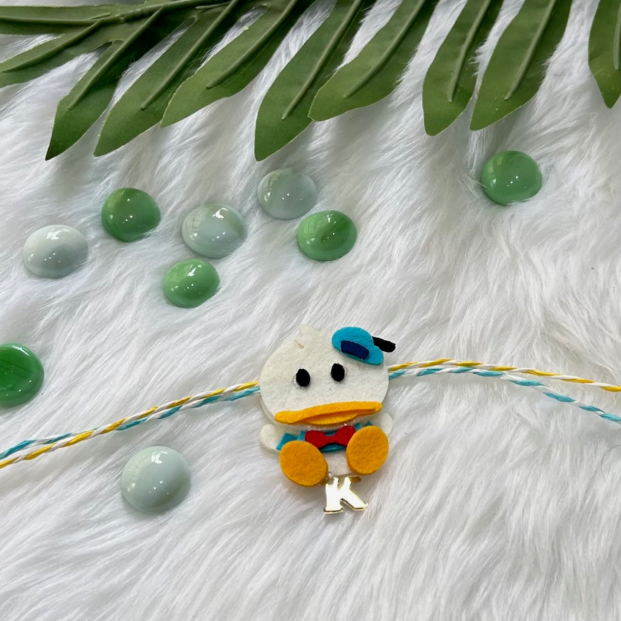 Babble Wrap Handmade Felt Rakhi With Initials - Donald Duck