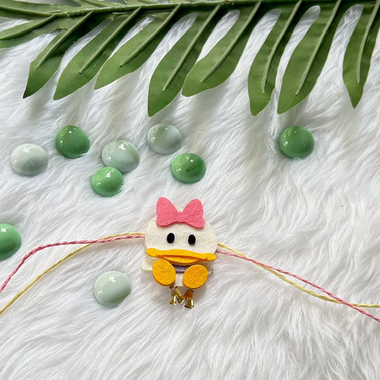 Babble Wrap Handmade Felt Rakhi With Initials - Daffy Duck