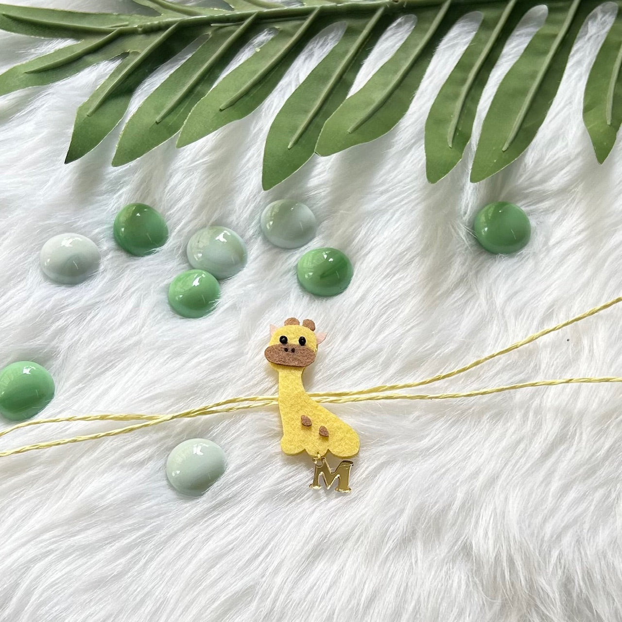 Babble Wrap Handmade Felt Rakhi With Initials - Giraffe