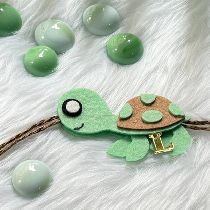 Babble Wrap Handmade Felt Rakhi With Initials - Turtle Tie